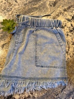 Light Wash Denim Fringe Hem Shorts - Women